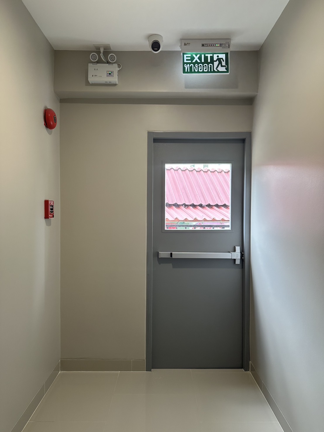 Marked fire exit at NARA Residence